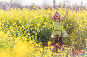 young girl in a mustard field in san jose