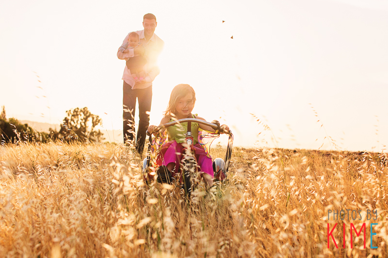 san jose family photographer, vintage, girl on vintage scwhinn tricycle, sunset, golden hour