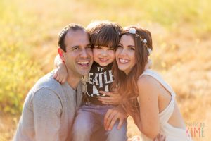 photos by kim e - san jose photographer - family session at rancho san antonio - sunset - rustic - family session - golden hour - family of three pose