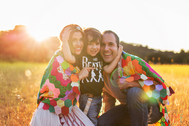 photos by kim e - san jose photographer - family session at rancho san antonio - sunset - rustic - family session - golden hour - family of three posing 