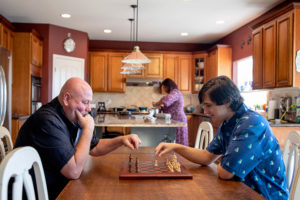 Family breakfast with a chess game