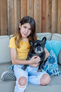 Girl with her french bulldog