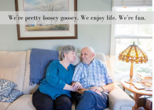 Grandma Grandpa kissing on the couch