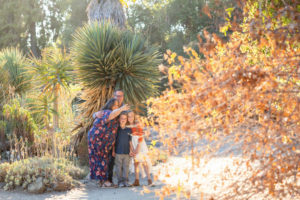 Family of four taking a selfie at the Stanford Cactus Garden