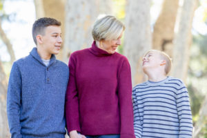 fall portraits at vasona park with mom looking at her two sons