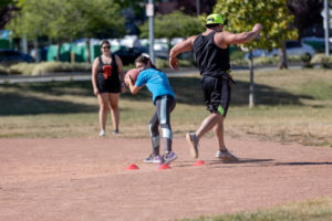 player tagging someone out at kickball