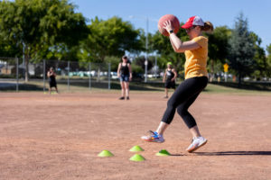 player catching a red kickball