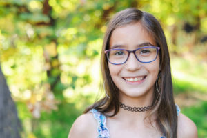 san jose pop up portrait of a young girl wearing glasses