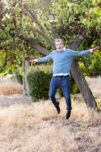 san jose portrait photography session of a young man jumping in the air