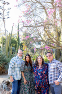 two sets of parents at stanford cactus garden for extended family photos