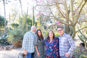 two sets of parents at stanford cactus garden for extended family photos