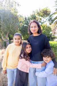 mom portrait with her three kids