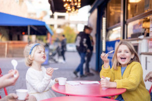 two girls excited to have ice cream at humphry slocombe in Oakland