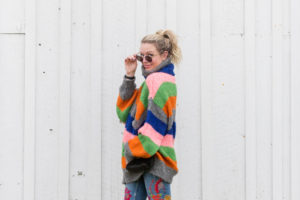fashion lifestyle san jose blogger wearing a striped sweater and sunglasses