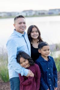 dad portrait with his three kids