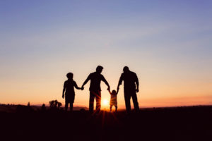 family of four silhouette photograph during a san jose sunset