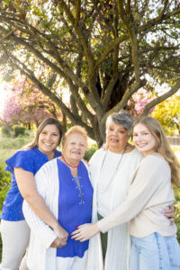 generational photo of moms, granddaughter and grandmas for their family photo