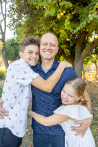 dad with his kids for photo combinations of a family portrait session