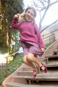 little girl jumping in the air