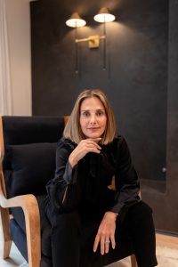 realtor branding photos in san jose with a realtor sitting in a chair